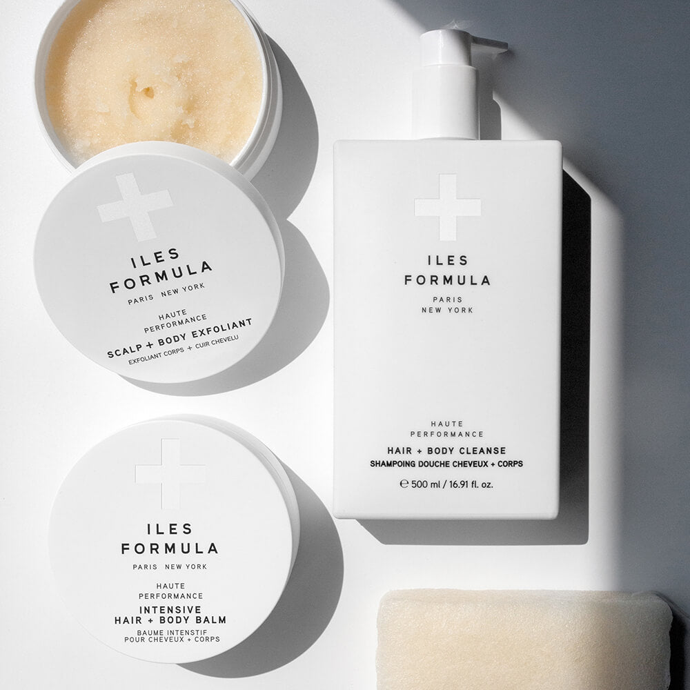 Spa Collection Flat Lay; Scalp + Body Exfoliant, Intensive Hair + Body Balm, Hair + Body Cleanser, and Body Sponge